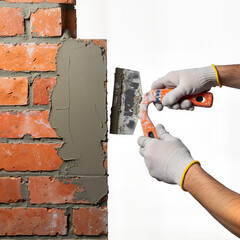 Hands applying plaster to a brick wall during repair process  