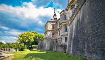 View Castle Podgoretsky - Historical Castle with Stone Walls on a Green Lawn