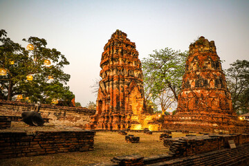 Wat Mahathat, Ayutthaya, houses the relics of Lord Buddha. It features sandstone Buddha head covered with roots of a Bodhi tree, unique and beautiful sight that has become renowned as another wonder.