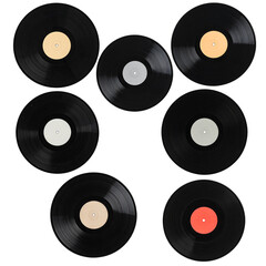 Nine vinyl records, various colored labels, arranged in a grid pattern