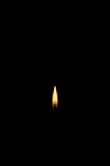 Single glowing candle on soft green backdrop—serene minimal image for memorials, prayer cards, vigils, and calming designs.