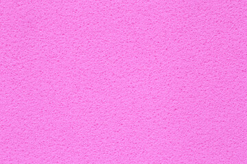 pink backdrop: close up of flat sponge surface