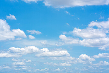 Obraz premium Beautiful blue sky with scattered clouds for background and texture.