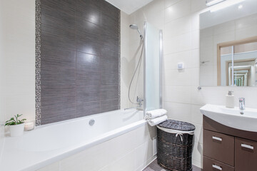 Modern Bright Home Bathroom Interior with Bathtub and Sink in Minimalist Style