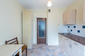 Minimalist Kitchen Interior with Wooden Cabinets and Neutral Color Palette