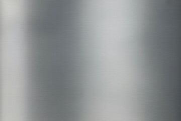 Sleek brushed metal texture background provides a modern, industrial, and professional aesthetic for design projects.