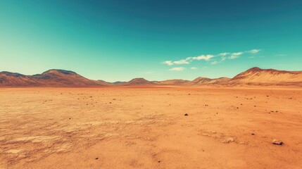Fototapeta premium Vast arid landscape under a clear sky