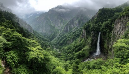 Lush valley with waterfall