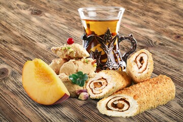 Traditional plate with sweet date fruits and tea