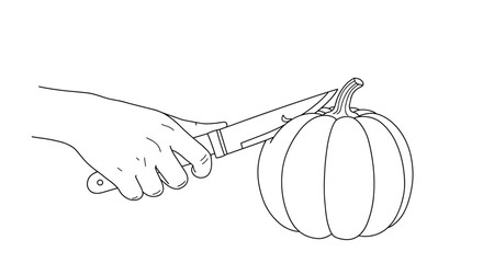 Hand cutting a pumpkin with knife for Halloween decoration  