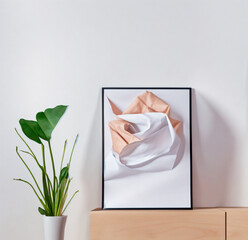 Abstract framed artwork with fabric shapes