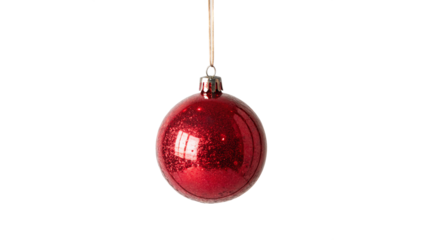 Bright red Christmas ornament hanging against , capturing the festive spirit of the holiday season on a transparent background
