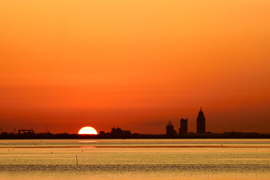 Sun Sets Beyond Mobile, Alabama, Skyline