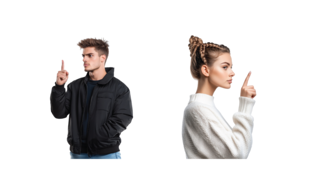 Young man and woman pointing upwards with focused expressions