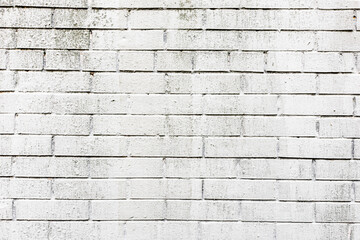 brick wall of building painted white