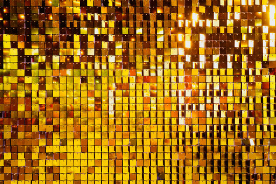 Gold texture glitter or grunge gold mosaic texture background. Golden sequins texture festive background.
