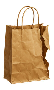 Ripped brown paper bag with string handle on a white background.