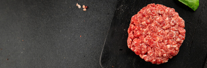 Raw cutlet meat burger ground meat beef, pork fresh natural product tasty snack delicious gourmet food background on the table rustic top view copy space