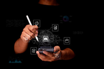 A person uses a stylus on a smartphone, surrounded by digital icons representing technology, data, and connectivity in a dark background.