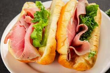 Ham sandwich green leaf salad, spam, meat snack vegetables natural product tasty tasty snack fresh delicious gourmet food background on the table rustic top view copy space