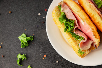 Ham sandwich green leaf salad, spam, meat snack vegetables natural product tasty tasty snack fresh delicious gourmet food background on the table rustic top view copy space