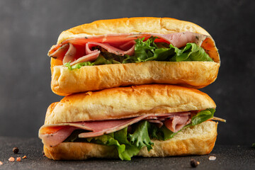 Ham sandwich green leaf salad, spam, meat snack vegetables natural product tasty tasty snack fresh delicious gourmet food background on the table rustic top view copy space