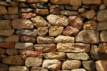 Stone Wall Fence Made Of Stacked Rocks