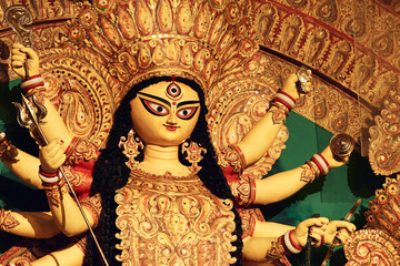 Closeup of Hindu Goddess Durga inside a pandal during Durga puja festival in Kolkata. In 2021, the festival has been declared UNESCO's Intangible Cultural Heritage of Humanity.