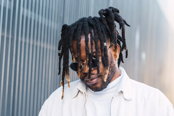 Portrait Of Stylish African Man looking at camera