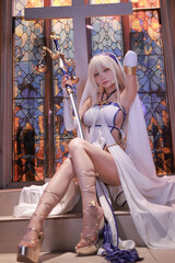 Elegant anime character with blonde hair and a white outfit, holding a staff with scales, posing...