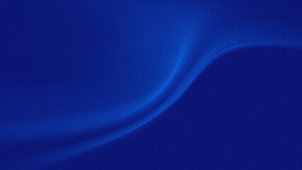 The blue background has a blurry wave or curve pattern, the surface appears to have a rough grain effect