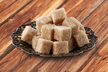Ramadan concept, sugar in muslim bronze plate