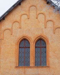 Fototapeta premium antique windows in luxurious houses of the old town