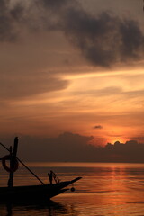 fishing boat at sunset
