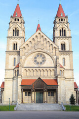 An ancient Christian church with a red roof. An ancient church with towers