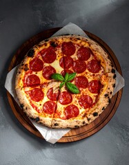 Close-up of pepperoni pizza on wooden board, golden rustic crust, melted mozzarella, crisp pepperoni, basil garnish, parchment paper, dark stone background, soft light.