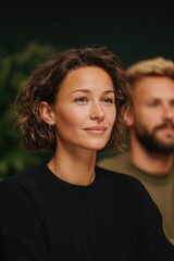 Focused expression during discussion, showcasing engagement and