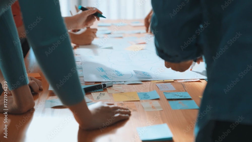 Poster close up of developer team using mind map to brainstorm idea. top view of skilled group of business 
