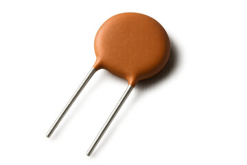 orange ceramic disc non-polar capacitor — radial lead through-hole pcb component for electronics, prototyping and circuit protection.