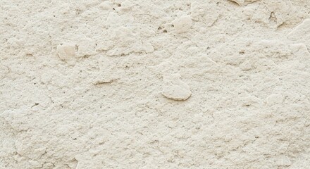 Close-up View of Textured Light Beige Stone Wall Surface