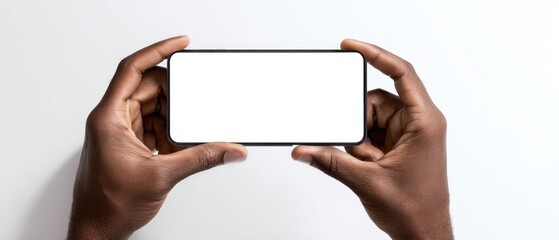 The smartphone held in hands with a blank display for customization.
