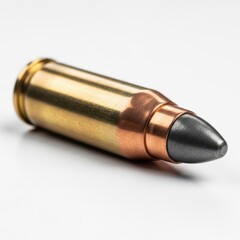Close up of a single rifle cartridge bullet isolated on white background