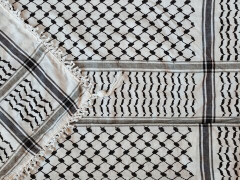 Folded Palestinian kufiya simulating a flag.