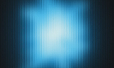Photo of abstract blue light emanating from a textured dark background