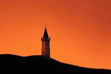 Silhouette of Medieval Tower Against Fiery Orange Sunset Sky, Dramatic Composition.