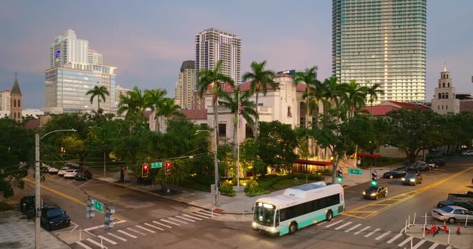 St. Petersburg city in Florida, USA. Aerial view of illuminated downtown district with modern mid-rise and high-rise buildings au dusk.