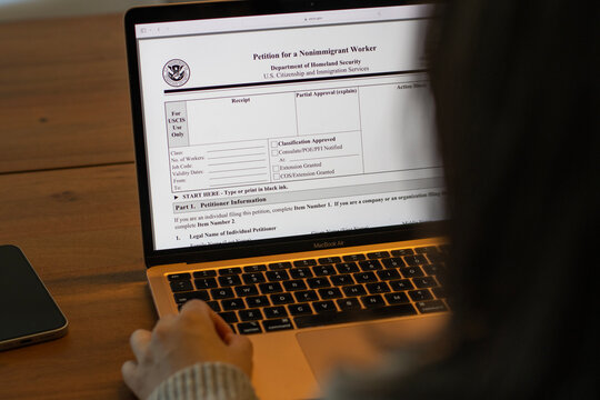 Portland, OR, USA - Sep 23, 2025: Form I-129, Petition for a Nonimmigrant Worker, is seen from the website of U.S. Citizenship and Immigration Services (USCIS) on the screen of a computer.