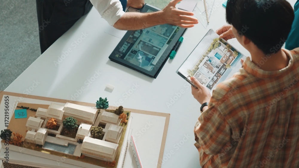 Poster professional architect engineer sitting while explain house plan to manager. aerial view of smart de