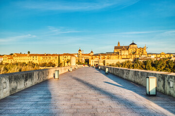 Mezquita Cathedral and Roman Bridge in Cordoba at Sunset, Andalusia