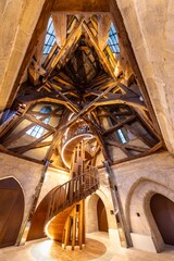 Paris, France - September 20, 2025: A new wooden staircase now rises inside the South Tower of Notre-Dame Cathedral. Rebuilt in solid oak after the 2019 fire